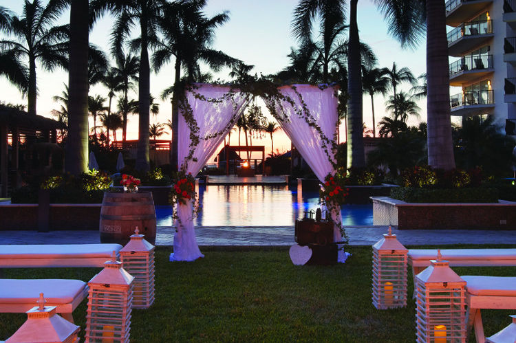 wedding arch at the Marriott Aruba Resort at sunset
